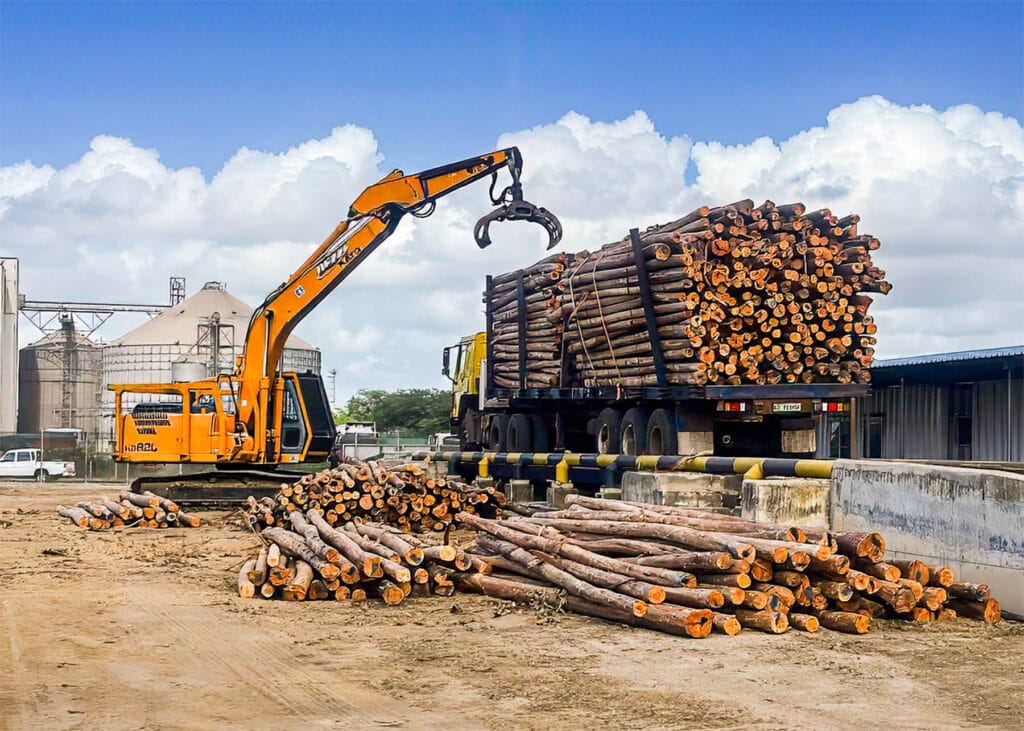 Moz Fibra loading timber logs onto a truck at their Beira Port site Mozambique